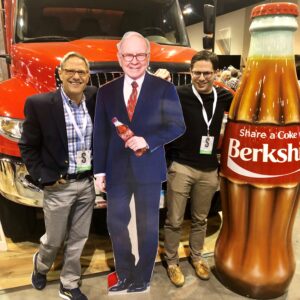 Estate planning attorney Marvin Blum with son Adam and a cutout of Warren Buffett
